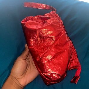 Mini bag can be used for anything. A hair bad, feminine hygiene bag, makeup bag.